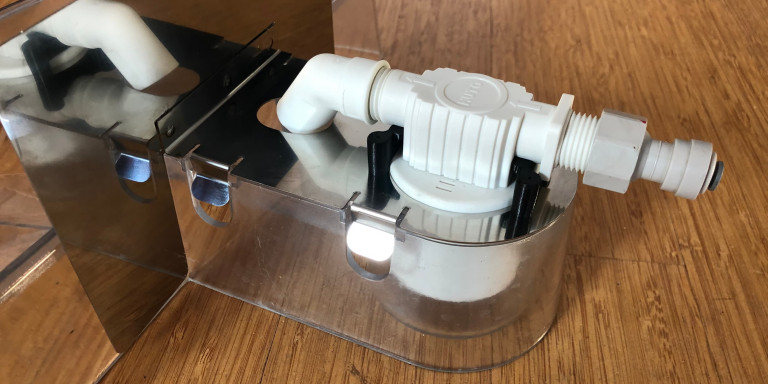 Compact integrated floating valve for the Infinity Bowl